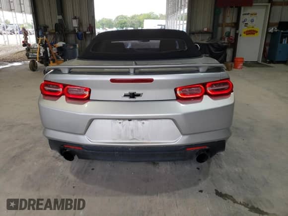 2019 Chevrolet Camaro 1LT с VIN 1G1FB3DX6K0112911, выставлен на аукционе Copart как лот 67308785 с пробегом 83 238 миль миль и Списание • Salvage title. История ставок и продаж доступна на DreamBid. Изображение 6.