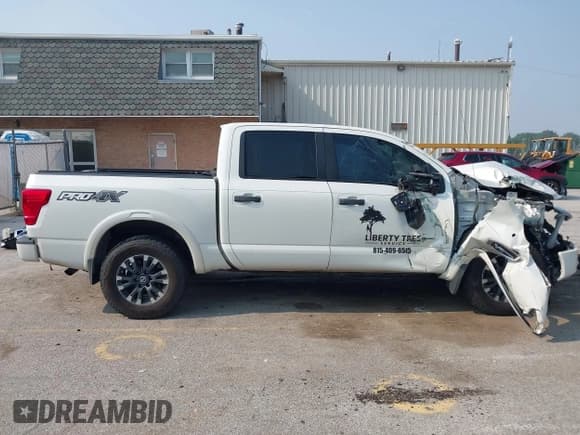 ✅ 2017 Nissan Titan SV • VIN: 1N6AA1E59HN541474 • Lot: 42884307. Listed on IAAI with 100,422 mi. Free auction sales archive from the USA and detailed vehicle history report at DreamBid. Image 14.