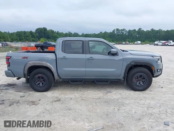 ✅ 2025 Nissan Frontier SV • VIN: 1N6ED1EKXSN600263 • Lot: 42882428. Listed on IAAI with 9,463 mi. Free auction sales archive from the USA and detailed vehicle history report at DreamBid. Image 13.