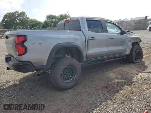 2023 Chevrolet Colorado 4WD ZR2 with VIN 1GCPTFEK5P1235565, listed as a Copart auction lot 61607045 with 42,500 mi miles and Salvage title. Bid and sale history available at DreamBid. Image 3.