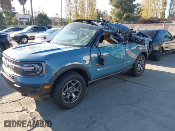 ✅ 2023 Ford Bronco Sport Badlands • VIN: 3FMCR9D91PRD95697 • Lot: 43799118. Listed on IAAI with 13,890 mi. Free auction sales archive from the USA and detailed vehicle history report at DreamBid. Image 2.