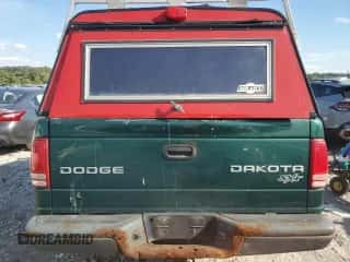 2003 Dodge Dakota z VIN 1D7GG16X73S359140, wystawiony jako Copart lot #72383124 z przebiegiem Nie podano mil oraz Szkoda całkowita • Salvage title. Historia ofert i sprzedaży dostępna na DreamBid. Obrazek 6.