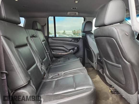 2015 Chevrolet Suburban LT with VIN 1GNSKJKC6FR660894, listed as a Copart auction lot 82732065 with 47,176 mi miles and Salvage title. Bid and sale history available at DreamBid. Image 11.