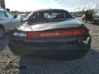 2014 Dodge Challenger SXT z VIN 2C3CDYAG3EH208523, wystawiony jako Copart lot #72553994 z przebiegiem 133 768 mil mil oraz Szkoda całkowita • Salvage title. Historia ofert i sprzedaży dostępna na DreamBid. Obrazek 6.