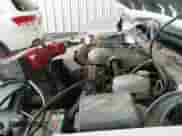 2005 Chevrolet Suburban LS z VIN 1GNFK16Z45J176719, wystawiony jako IAAI lot #42325067 z przebiegiem 199 884 mil mil oraz . Historia ofert i sprzedaży dostępna na DreamBid. Obrazek 22.