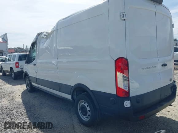 ✅ 2024 Ford Transit Cargo • VIN: 1FTBR1C8XRKA46961 • Lot: 41823255. Listed on IAAI with 4,292 mi. Free auction sales archive from the USA and detailed vehicle history report at DreamBid. Image 3.