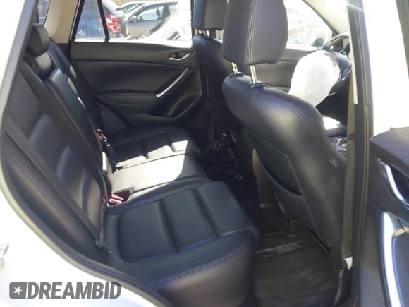 ✅ 2016 Mazda CX-5 Grand Touring • VIN: JM3KE4DY8G0908425 • Lot: 43350691. Wystawiony na IAAI z przebiegiem 144 684 mil. Bezpłatny archiwum sprzedaży aukcyjnych z USA i szczegółowy raport historii pojazdu na DreamBid. Zdjęcie 8.