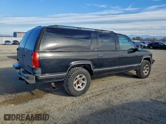 ✅ 1999 Chevrolet Suburban • VIN: 1GNFK16R6XJ567728 • Лот: 94811155. Опубликован ранее на Copart с пробегом 205 904 миль. Бесплатный доступ к архиву аукционных продаж из США и подробный отчёт об истории автомобиля на DreamBid. Изображение 3.