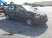 ✅ 2014 Chevrolet Sonic LT • VIN: 1G1JC5SH9E4151553 • Lot: 43789246. Listed on IAAI with 95,937 mi. Free auction sales archive from the USA and detailed vehicle history report at DreamBid. Image 1.