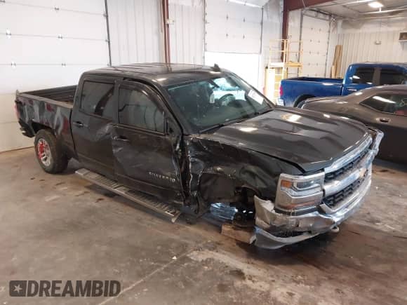 2018 Chevrolet Silverado 1500 LT z VIN 3GCUKREC0JG519095, wystawiony jako IAAI lot #43271594 z przebiegiem 108 548 mil mil oraz . Historia ofert i sprzedaży dostępna na DreamBid. Obrazek 1.