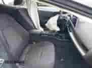 2024 Toyota Prius LE with VIN JTDACAAU6R3046057, listed as a IAAI auction lot 43316816 with 14,220 mi miles and . Bid and sale history available at DreamBid. Image 5.