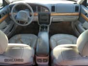 ✅ 1999 Lincoln Continental • VIN: 1LNHM97V2XY719495 • Lot: 42239665. Listed on Copart with 234,544 mi. Free auction sales archive from the USA and detailed vehicle history report at DreamBid. Image 8.