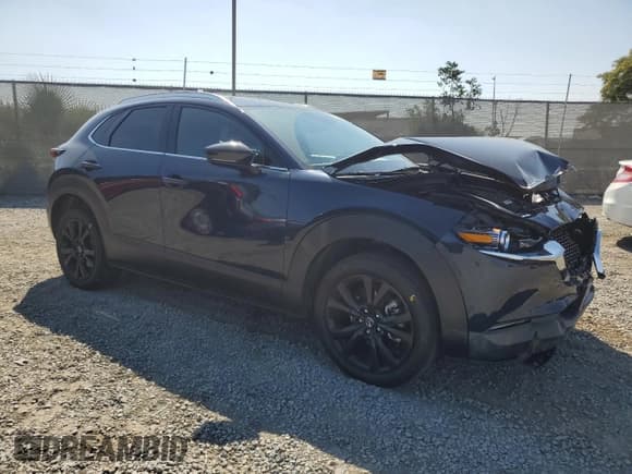 ✅ 2023 Mazda CX-30 Premium • VIN: 3MVDMBDY2PM551196 • Lot: 63128945. Listed on Copart with 28,893 mi. Free auction sales archive from the USA and detailed vehicle history report at DreamBid. Image 4.