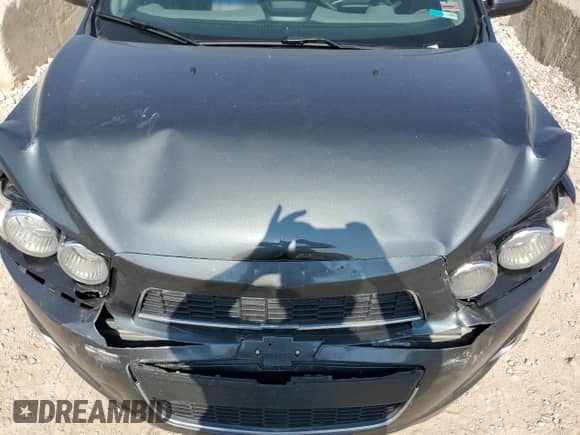 2012 Chevrolet Sonic LTZ z VIN 1G1JE5SB9C4203167, wystawiony jako Copart lot #60261265 z przebiegiem 98 744 mil mil oraz Czysty tytuł • Clean title. Historia ofert i sprzedaży dostępna na DreamBid. Obrazek 11.