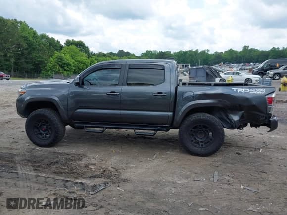 ✅ 2023 Toyota Tacoma SR • VIN: 3TMCZ5AN3PM567076 • Lot: 42274869. Listed on IAAI with 41,355 mi. Free auction sales archive from the USA and detailed vehicle history report at DreamBid. Image 14.