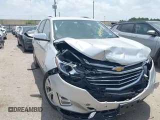 ✅ 2021 Chevrolet Equinox Premier • VIN: 3GNAXNEV8MS160599 • Лот: 42744950. Опубликован ранее на IAAI с пробегом 43 002 миль. Бесплатный доступ к архиву аукционных продаж из США и подробный отчёт об истории автомобиля на DreamBid. Изображение 1.