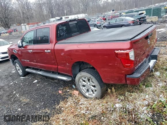 ✅ 2016 Nissan Titan Platinum Reserve • VIN: 1N6BA1F25GN509256 • Lot: 95889345. Listed on Copart with 174,277 mi. Free auction sales archive from the USA and detailed vehicle history report at DreamBid. Image 2.