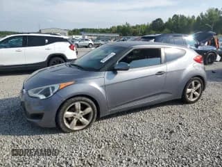 ✅ 2014 Hyundai Veloster • VIN: KMHTC6AD7EU218022 • Lot: 81737515. Wystawiony na Copart z przebiegiem 186 403 mil. Bezpłatny archiwum sprzedaży aukcyjnych z USA i szczegółowy raport historii pojazdu na DreamBid. Zdjęcie 1.
