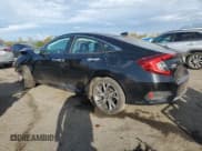 ✅ 2020 Honda Civic Touring • VIN: 19XFC1F91LE209613 • Лот: 86548155. Опубликован ранее на Copart с пробегом 126 179 миль. Бесплатный доступ к архиву аукционных продаж из США и подробный отчёт об истории автомобиля на DreamBid. Изображение 2.
