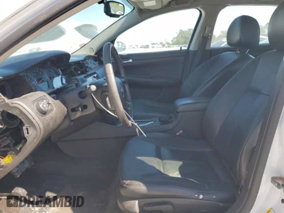 ✅ 2013 Chevrolet Impala LTZ • VIN: 2G1WC5E38D1215761 • Lot: 90534035. Listed on Copart with 205,467 mi. Free auction sales archive from the USA and detailed vehicle history report at DreamBid. Image 7.