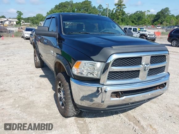 ✅ 2014 Ram 2500 SLT • VIN: 3C6TR5DT4EG217792 • Lot: 42489013. Listed on IAAI with 190,773 mi. Free auction sales archive from the USA and detailed vehicle history report at DreamBid. Image 1.