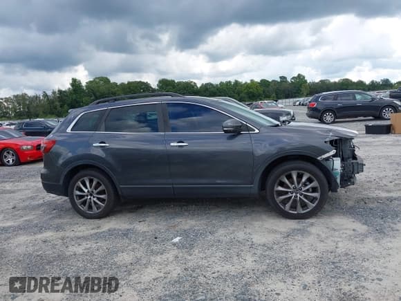 ✅ 2014 Mazda CX-9 Grand Touring • VIN: JM3TB2DA2E0433985 • Lot: 43062902. Wystawiony na IAAI z przebiegiem 127 332 mil. Bezpłatny archiwum sprzedaży aukcyjnych z USA i szczegółowy raport historii pojazdu na DreamBid. Zdjęcie 14.