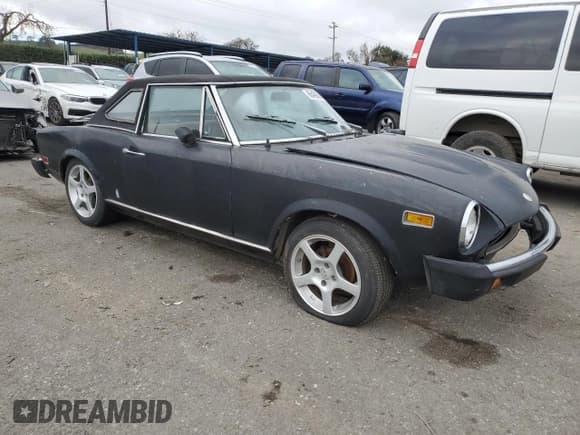 ✅ 1976 FIAT 124 Spider • VIN: 124CS10107235 • Lot: 86426594. Listed on Copart with 83,804 mi. Free auction sales archive from the USA and detailed vehicle history report at DreamBid. Image 4.