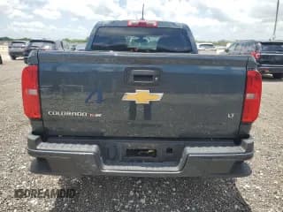 ✅ 2020 Chevrolet Colorado 2WD LT • VIN: 1GCGSCEN1L1157162 • Лот: 64085464. Опубликован ранее на Copart с пробегом 91 481 миль. Бесплатный доступ к архиву аукционных продаж из США и подробный отчёт об истории автомобиля на DreamBid. Изображение 6.