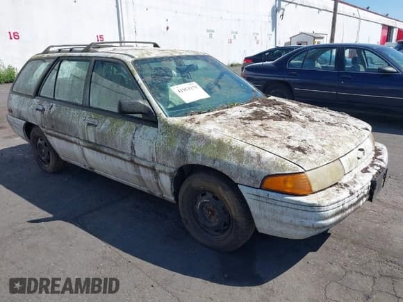 ✅ 1996 Ford Escort LX • VIN: 1FASP15J6TW156952 • Lot: 41953279. Wystawiony na IAAI z przebiegiem 141 145 mil. Bezpłatny archiwum sprzedaży aukcyjnych z USA i szczegółowy raport historii pojazdu na DreamBid. Zdjęcie 1.