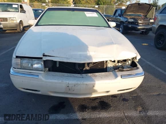 ✅ 1997 Cadillac Eldorado Touring • VIN: 1G6ET1294VU613949 • Lot: 42828965. Wystawiony na IAAI z przebiegiem 90 199 mil. Bezpłatny archiwum sprzedaży aukcyjnych z USA i szczegółowy raport historii pojazdu na DreamBid. Zdjęcie 13.