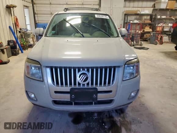 2009 Mercury Mariner Premier с VIN 4M2CU87769KJ12378, выставлен на аукционе Copart как лот 69630725 с пробегом 67 949 миль миль и На запчасти • Non repairable. История ставок и продаж доступна на DreamBid. Изображение 5.