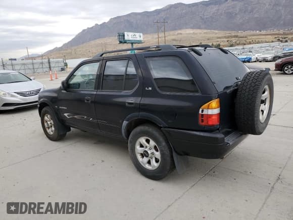 ✅ 1999 Isuzu Rodeo S • VIN: 4S2CM58W5X4384016 • Lot: 92869855. Wystawiony na Copart z przebiegiem 206 792 mil. Bezpłatny archiwum sprzedaży aukcyjnych z USA i szczegółowy raport historii pojazdu na DreamBid. Zdjęcie 2.