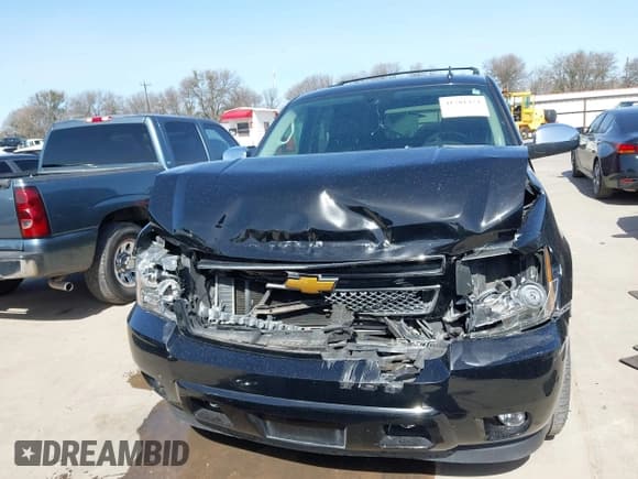 ✅ 2009 Chevrolet Tahoe LTZ • VIN: 1GNFC33J69R285570 • Lot: 41701424. Listed on IAAI with 165,811 mi. Free auction sales archive from the USA and detailed vehicle history report at DreamBid. Image 12.