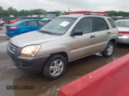 ✅ 2007 Kia Sportage LX • VIN: KNDJE723677332922 • Лот: 42255864. Опубликован ранее на IAAI с пробегом 194 622 миль. Бесплатный доступ к архиву аукционных продаж из США и подробный отчёт об истории автомобиля на DreamBid. Изображение 2.