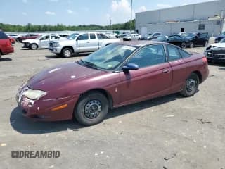 ✅ 2002 Saturn SC • VIN: 1G8ZP12802Z160061 • Лот: 63977825. Опубликован ранее на Copart с пробегом 189 237 миль. Бесплатный доступ к архиву аукционных продаж из США и подробный отчёт об истории автомобиля на DreamBid. Изображение 1.