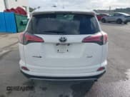 ✅ 2018 Toyota RAV4 XLE • VIN: 2T3WFREV2JW512910 • Lot: 42772049. Listed on IAAI with 138,019 mi. Free auction sales archive from the USA and detailed vehicle history report at DreamBid. Image 17.