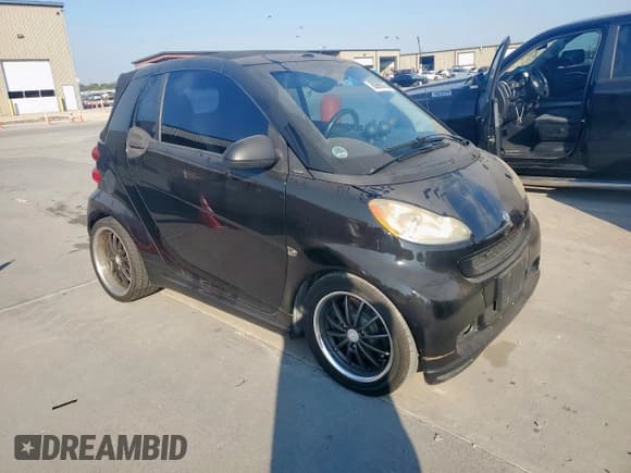 ✅ 2009 Smart fortwo Passion • VIN: WMEEK31X59K243576 • Лот: 80968335. Опубликован ранее на Copart с пробегом 101 847 миль. Бесплатный доступ к архиву аукционных продаж из США и подробный отчёт об истории автомобиля на DreamBid. Изображение 4.