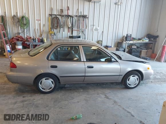 ✅ 1999 Toyota Corolla LE • VIN: 2T1BR12EXXC198079 • Лот: 43469173. Опубликован ранее на IAAI с пробегом 84 359 миль. Бесплатный доступ к архиву аукционных продаж из США и подробный отчёт об истории автомобиля на DreamBid. Изображение 13.