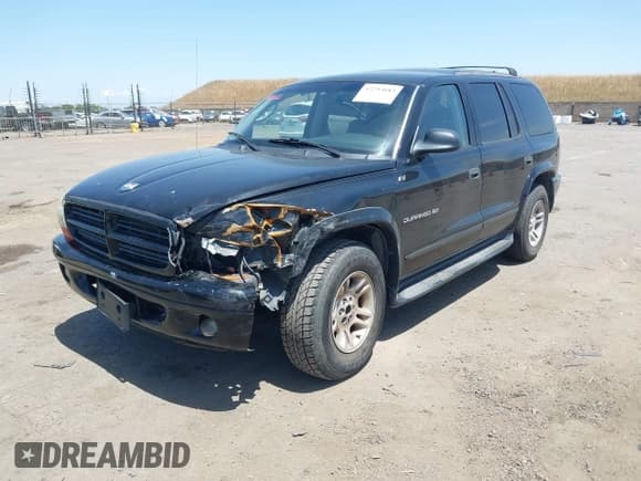 ✅ 2001 Dodge Durango • VIN: 1B4HR28N31F570834 • Lot: 42293683. Wystawiony na IAAI z przebiegiem 131 225 mil. Bezpłatny archiwum sprzedaży aukcyjnych z USA i szczegółowy raport historii pojazdu na DreamBid. Zdjęcie 2.