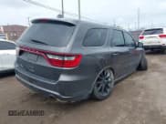 ✅ 2018 Dodge Durango R/T • VIN: 1C4SDJCT0JC372124 • Lot: 42259990. Listed on IAAI with 131,414 mi. Free auction sales archive from the USA and detailed vehicle history report at DreamBid. Image 4.