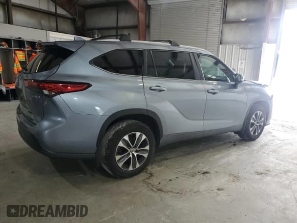 ✅ 2023 Toyota Highlander Hybrid XLE • VIN: 5TDKBRCH1PS106456 • Lot: 67240425. Listed on Copart with 295,759 mi. Free auction sales archive from the USA and detailed vehicle history report at DreamBid. Image 3.