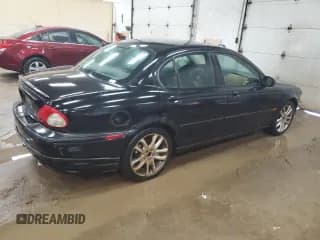 ✅ 2005 Jaguar X-Type 3.0L • VIN: SAJWA51C05WE41522 • Лот: 62837564. Опубликован ранее на Copart с пробегом 91 885 миль. Бесплатный доступ к архиву аукционных продаж из США и подробный отчёт об истории автомобиля на DreamBid. Изображение 3.