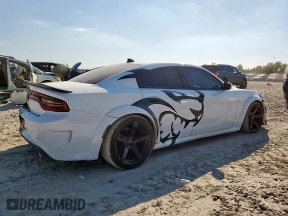 ✅ 2018 Dodge Charger • VIN: 0K0740032512 • Лот: 85167555. Опубликован ранее на Copart с пробегом 56 499 миль. Бесплатный доступ к архиву аукционных продаж из США и подробный отчёт об истории автомобиля на DreamBid. Изображение 3.