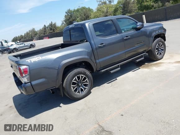 ✅ 2023 Toyota Tacoma SR5 • VIN: 3TMAZ5CN4PM204225 • Lot: 43006968. Listed on IAAI with 14,496 mi. Free auction sales archive from the USA and detailed vehicle history report at DreamBid. Image 4.