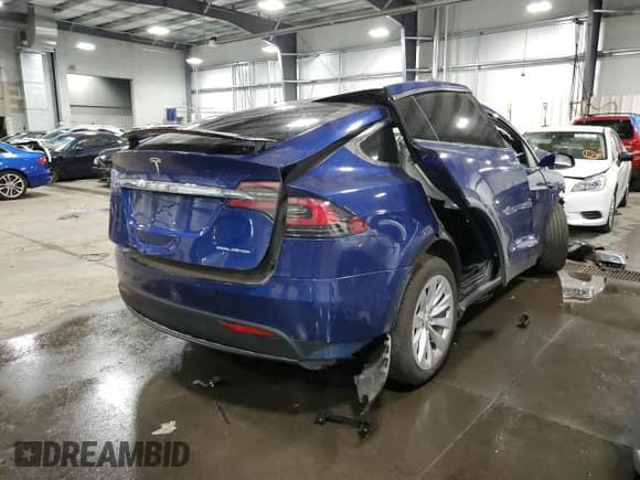 ✅ 2020 Tesla Model X Long Range • VIN: 5YJXCDE27LF232897 • Lot: 63048372. Listed on Copart with 28,854 mi. Free auction sales archive from the USA and detailed vehicle history report at DreamBid. Image 4.