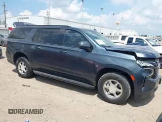 2021 Chevrolet Suburban RST z VIN 1GNSCEKD5MR228825, wystawiony jako IAAI lot #42916245 z przebiegiem 52 657 mil mil oraz . Historia ofert i sprzedaży dostępna na DreamBid. Obrazek 1.