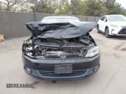 ✅ 2014 Volkswagen Jetta SEL • VIN: 3VWL17AJ7EM387562 • Lot: 43713817. Listed on IAAI with 128,310 mi. Free auction sales archive from the USA and detailed vehicle history report at DreamBid. Image 12.