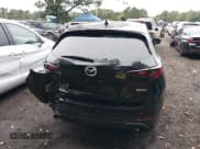 ✅ 2024 Mazda CX-5 S Carbon Edition • VIN: JM3KFBCL0R0432407 • Lot: 43172210. Wystawiony na IAAI z przebiegiem 22 759 mil. Bezpłatny archiwum sprzedaży aukcyjnych z USA i szczegółowy raport historii pojazdu na DreamBid. Zdjęcie 16.