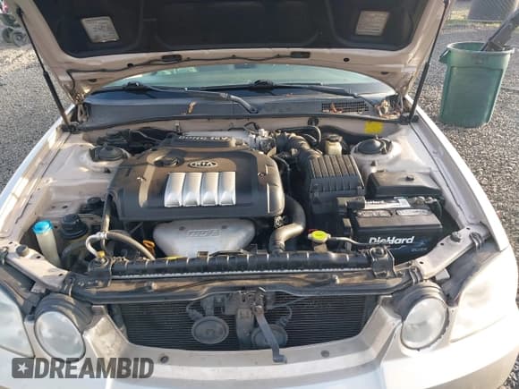 ✅ 2004 Kia Optima LX • VIN: KNAGD126045302372 • Лот: 41022315. Опубликован ранее на IAAI с пробегом 199 588 миль. Бесплатный доступ к архиву аукционных продаж из США и подробный отчёт об истории автомобиля на DreamBid. Изображение 10.