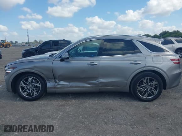 ✅ 2022 Genesis GV70 2.5T • VIN: KMUMADTB4NU059911 • Lot: 42149577. Listed on IAAI with 22,070 mi. Free auction sales archive from the USA and detailed vehicle history report at DreamBid. Image 14.